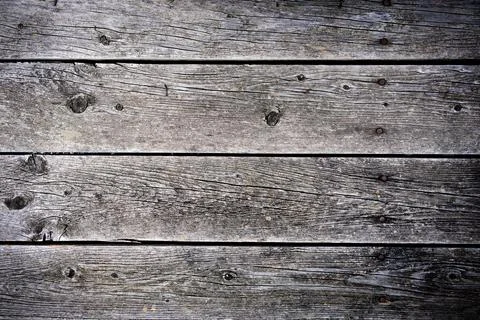 Weathered wooden planks create a rustic backdrop Stock Photos
