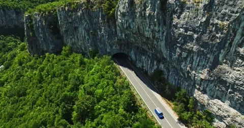 Weathered Worker Van Exiting Large Tunnel In Eastern Europe On Hot Summer Day Stock-Footage 300444219
