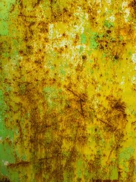 Weathered yellow steel surface with rust and corrosion outdoors Stock Photos