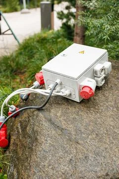 Weatherproof Junction Box with CEE Sockets on Stone Outdoors Stock Photos