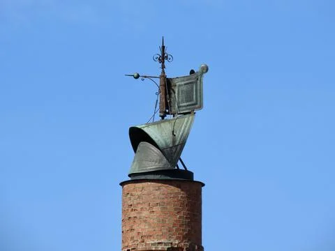 Weathervane on chimney Stock Photos