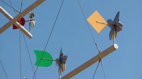Weathervane weather vane windmill colourful deep blue sky movement Stock Footage 48683347