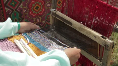 Weave carpet by hand the old way Stock Footage 63582820