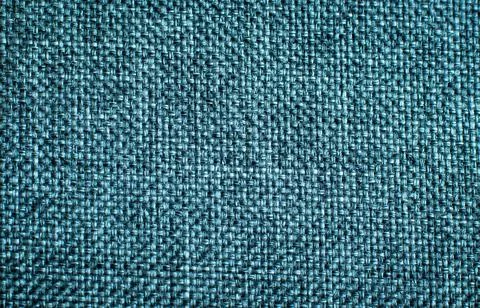 Weave pattern of yarn on fabric for use in background or wallpaper. Stock Photos