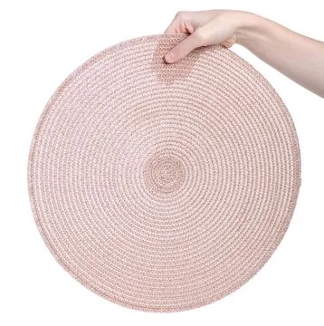 Weave placemat in hand isolated Stock Photos