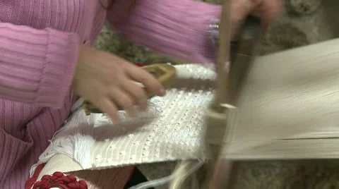 Weaver working on a traditional loom. Stock Footage 62953837
