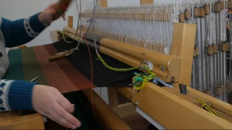 The weaver works at the loom 3 Stock-Footage 126961824