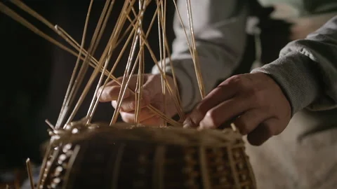 Weaving a basket from willow branches Stock Footage 170202238