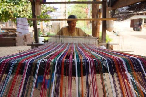 Weaving Fabric on a Loom Foto stock