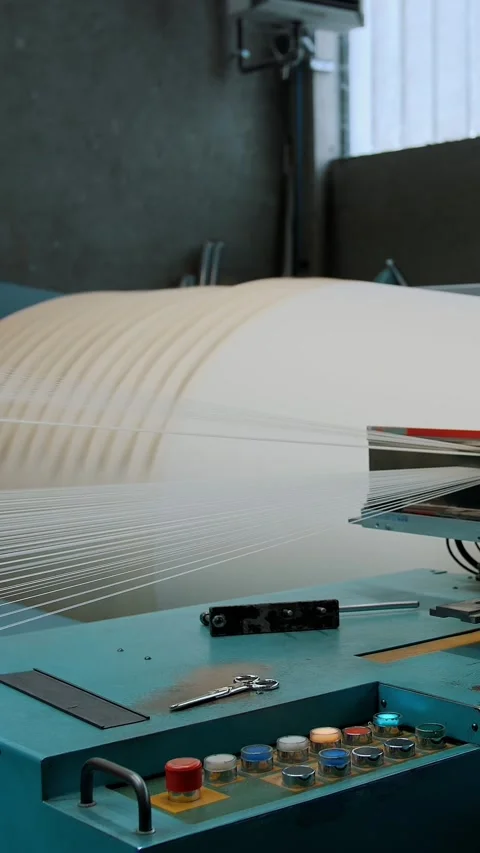 Weaving factory. thread coloring. textile industry. automated work process of Stock-Footage 319780813