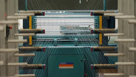 Weaving factory workshop. thread coloring. Textile factory equipment winds Stock-Footage 254590017