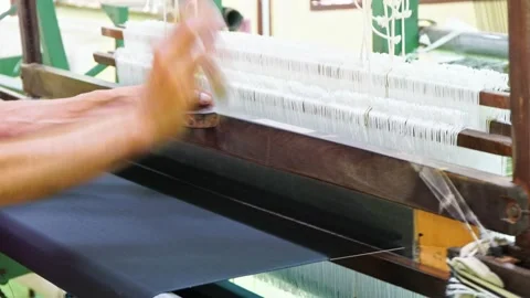 Weaving loom and shuttle on the warp Stock Footage 154573175