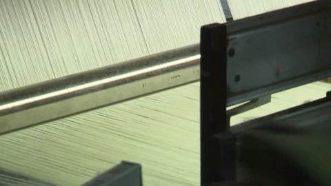 Weaving machine close up pan shot Stock Footage 78089356