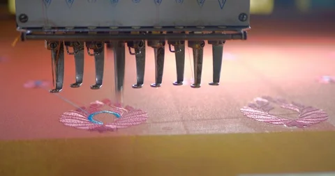 Weaving machine needle creating beautiful designs in silk sarees in slow motion Stock Footage 122409373