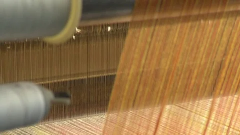 Weaving machine with orange fabric Video stock 78089028