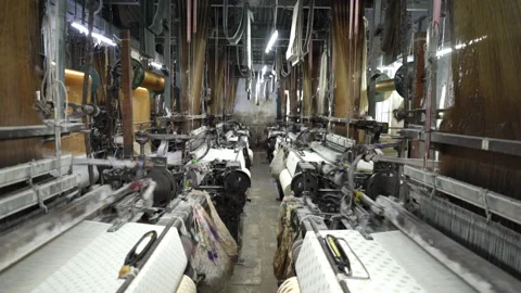 Weaving machine in textile production, Weaving loom  Stockbeeldmateriaal 164062578