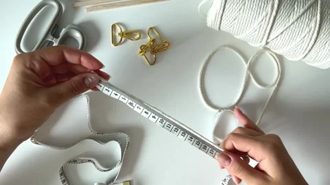 Weaving macrame. The girl weaves macrame. self made. Stock Footage 245420711