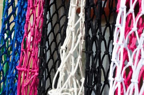 Weaving macrame knots from cotton threads. Stock Photos