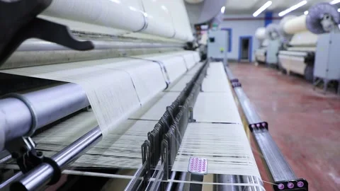 Weaving material on the machine 2 Stock Footage 165041315