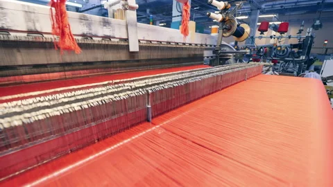 Weaving mechanism with lots of red threads going through it 스톡 동영상 159483251