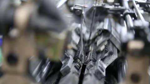 Weaving mill the machine is in operation close-up Video stock 77988354