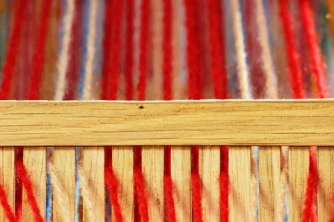 Weaving mini machine for making belts with patterns. Folk art, handmade. Deta Free Stock Photos