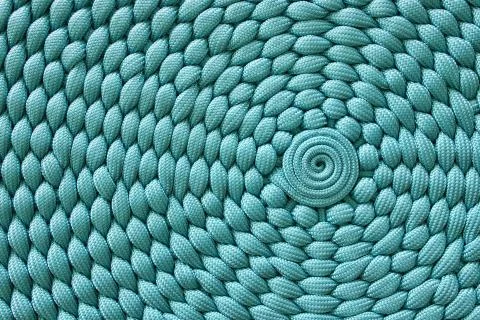 Weaving pattern with a center in a circle. Stock Photos