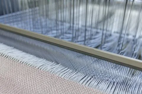 Weaving Process in Wool Production Factory with Spinning Machine Stock Photos