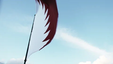 Weaving Qatar Flag On Cloudy Sky Stock Footage 222097290