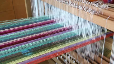 Weaving a towel on a home loom Stock Footage 48721834