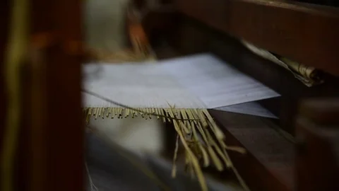 Weaving in the weft grass straws Stock Footage 71199209