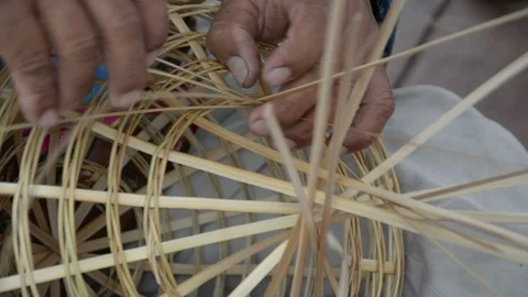 Weaving a wicker basket by handmade Stock Footage 86221928