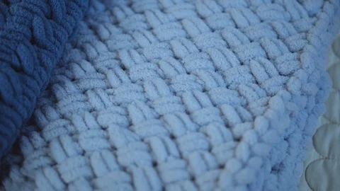 Weaving with woolen threads of blue color Stock Footage 126662382