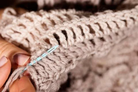 Weaving in yarn ends Stock Photos