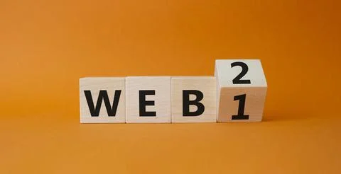 WEB 2 or 1 symbol. Turned wooden cubes with words WEB 1 and WEB 2. Beautifu.. Stockfoto's