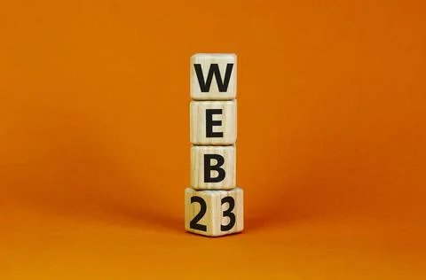 WEB 2 or 3 symbol. Turned a wooden cube and changed words WEB 2 to WEB 3. Bea Photos