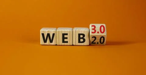 WEB 2.0 or 3.0 symbol. Turned a wooden cube and changed words WEB 2.0 to WEB  Photos