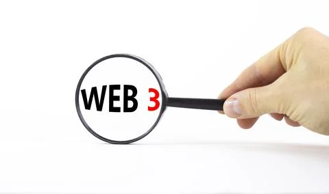 WEB 3 symbol. Concept words WEB 3. Magnifying glass. Beautiful white table, w 写真素材