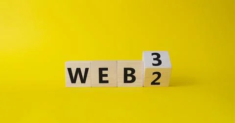 Web 3 vs Web 2 symbol. Turned wooden cubes with words web 2 vs web 3. Beaut.. Stockfoto's