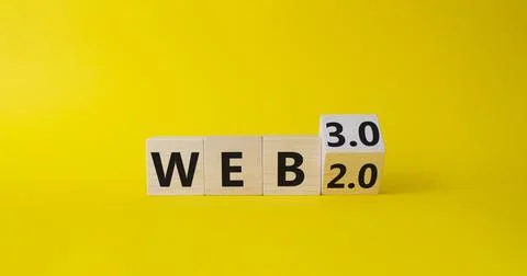 Web 3.0 vs Web 2.0 symbol. Turned wooden cubes with words web 2.0 to web 3... 写真素材