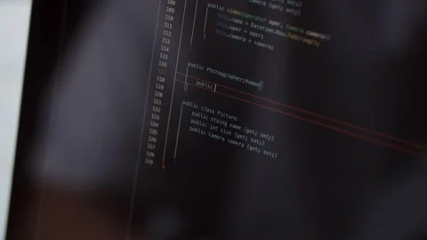 A web application developer writes the code. Cropped view of an experienced Stock Footage 236772928