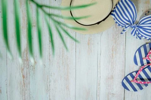 Web banner and flat lay summer time with swimsuit and beach accessories on vi Stock Photos