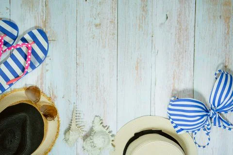 Web banner and flat lay summer time with swimsuit and beach accessories on vi Stock Photos