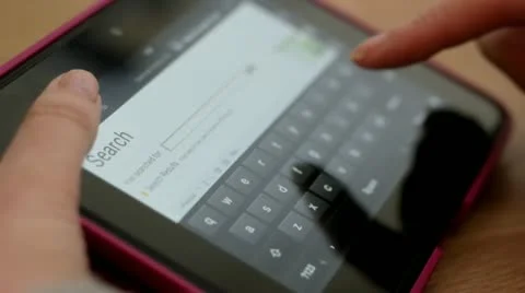 Web browsing with tablet computer Stock Footage 20486018