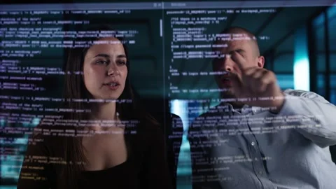 Web Coders Using Online Software Stock Footage 309312183