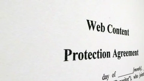 Web Content Protection Agreement Document Close-Up Showing Legal Contract T.. Video stock 336692958