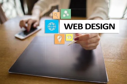 Web design and development concept on the virtual screen. Foto stock