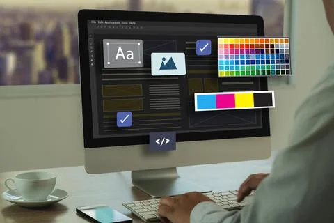 Web Design A developer designs a responsive web app with a modern layout, p.. 库存照片