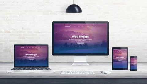 Web design, developer studio concept with responsive web page on multiple dis Stock Photos