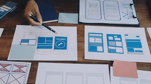 Web design process. The web designer creating a mockup of the mobile applic.. Stock Footage 291610808
